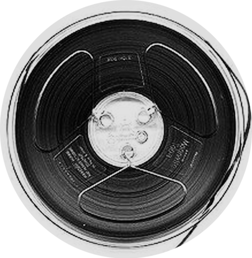 Black magnetic tape wound on a clear plastic spool.